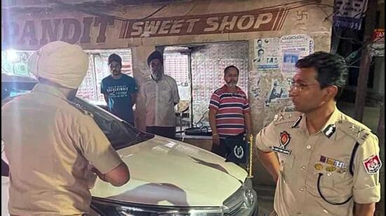 Ludhiana police commissioner Kaustubh Sharma performing night patrolling duties. (Harvinder Singh/HT)