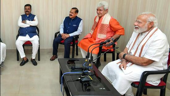 Prime Minister Narendra Modi interacts with the Panchayat members of Samba district on Sunday. (PTI)