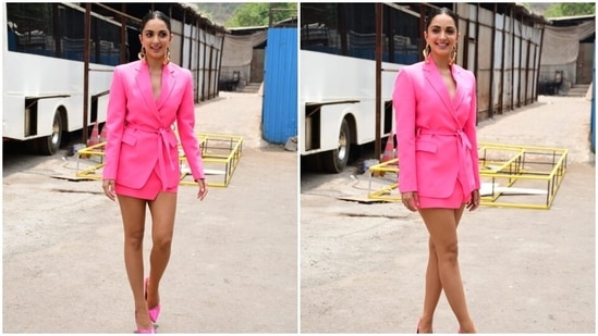 On Sunday, Kartik and Kiara stepped out in the city to promote their sequel to Priyadarshan's 2007 horror-comedy Bhool Bhulaiyaa. The two stars chose trendy colourful outfits for the occasion. Kiara looked stunning in a bubblegum-pink ensemble that served formal-chic vibes.(HT Photo/Varinder Chawla)