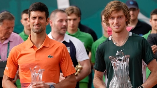 Andrey Rublev of Russia, right, poses with Novak Djokovic of Serbia after the final of Serbia Open(AP)