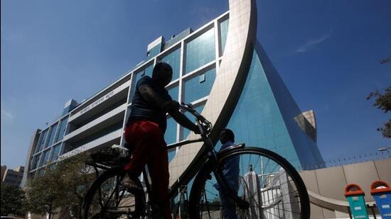 A man rides his bicycle past India's Central Bureau of Investigation (CBI) headquarters building in New Delhi, (REUTERS File Photo)