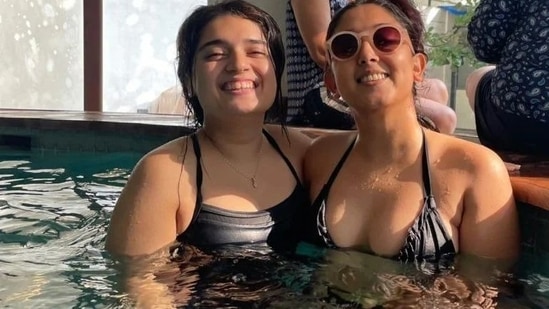 Ira Khan and her friend at a pool party.
