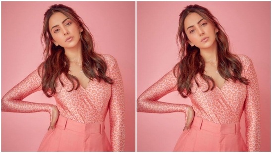 Styled by fashion stylist Anshika Verma, Rakul Preet wore her tresses open in wavy curls with a part of hair pulled back.(Instagram/@rakulpreet)