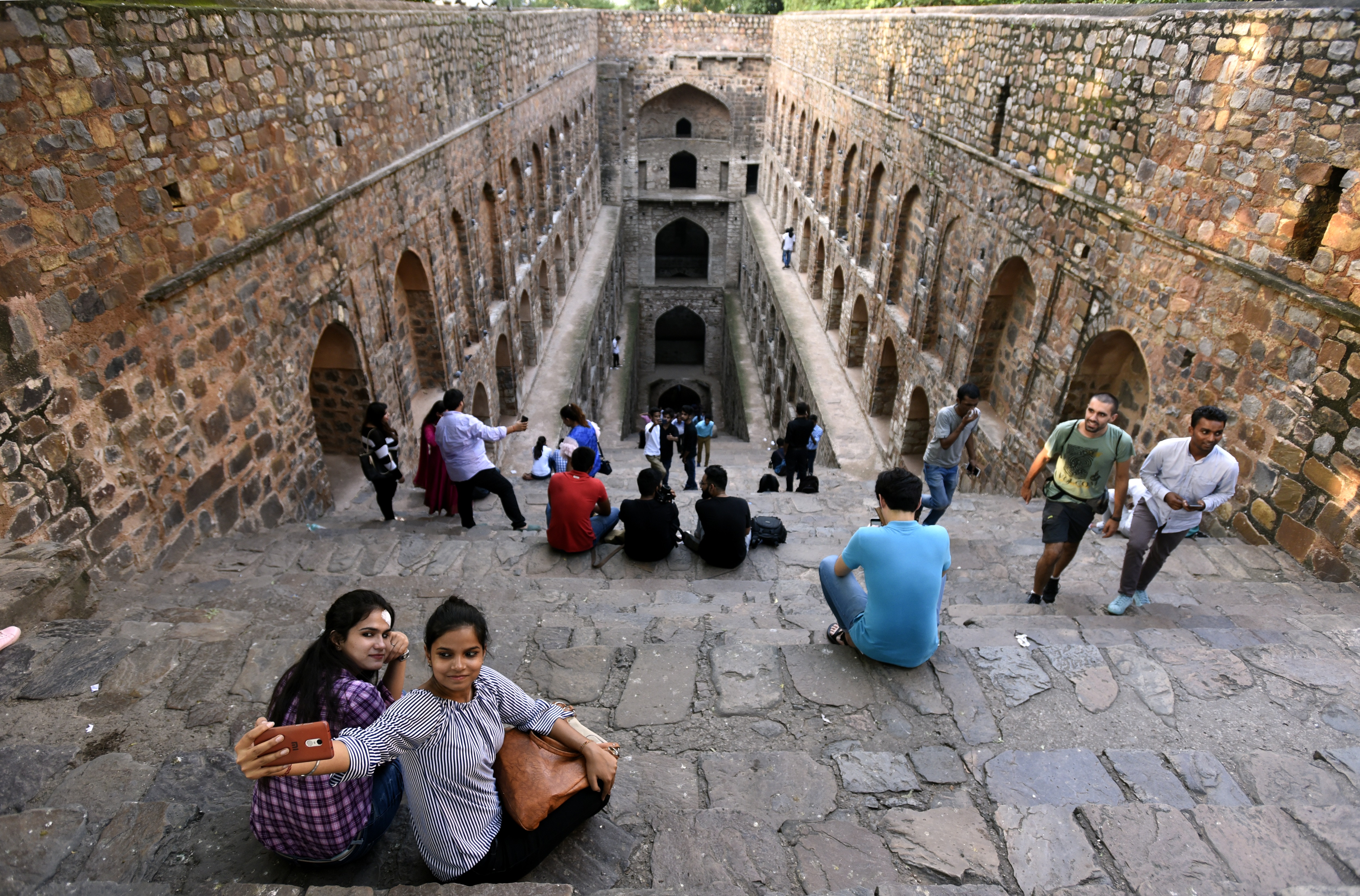 Youngsters are click-ready at Agrasen ki Baoli, one of the surviving ancient stepwells of Delhi. (Photo: Sonu Mehta/HT) Youngsters are click-ready at Agrasen ki Baoli, one of the surviving ancient stepwells of Delhi. (Photo: Sonu Mehta/HT)