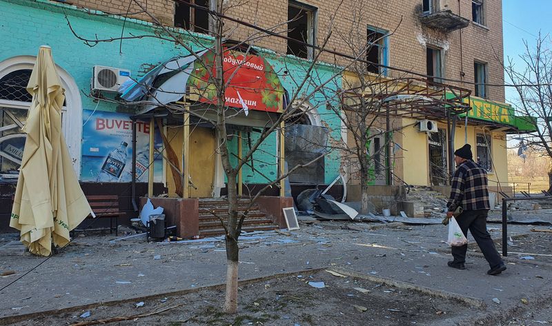 A man walks next to a residential building damaged by a shelling, as Russia's attack on Ukraine continues, in Rubizhne, the Luhansk region, Ukraine.&nbsp; (Reuters file photo)