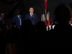 French President Emmanuel Macron celebrates with supporters in front of the Eiffel Tower Paris, France, Sunday, April 24, 2022. French President Emmanuel Macron celebrates with supporters in front of the Eiffel Tower Paris, France, Sunday, April 24, 2022. 