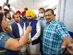 Delhi Chief Minister Arvind Kejriwal, Punjab Chief Minister Bhagwant Mann and Delhi Health Minister Satyendar Jain during their visit to a 'mohalla clinic', in New Delhi.