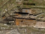 The Azovstal Steel Plant in Mariupol, Ukraine, with some large holes blasted in the roof. (Planet Labs via AP) The Azovstal Steel Plant in Mariupol, Ukraine, with some large holes blasted in the roof. (Planet Labs via AP)