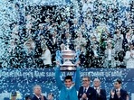 Spain's Carlos Alcaraz Garfia celebrates with the trophy after winning the final match against Pablo Carreno Busta