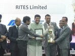 Union minister Piyush Goyal presents the trophy to RITES representatives in Delhi. Union minister Piyush Goyal presents the trophy to RITES representatives in Delhi.