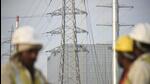 Gurugram, India-March 06: Modification work of high-tension power cables underway at Delhi-Gurugram Expressway (NH-48) near Ambience Mall, in Gurugram, India, on Sunday, March 6, 2022. (Photo by Parveen Kumar/Hindustan Times) **To go with Leena Dhankar's Story** Gurugram, India-March 06: Modification work of high-tension power cables underway at Delhi-Gurugram Expressway (NH-48) near Ambience Mall, in Gurugram, India, on Sunday, March 6, 2022. (Photo by Parveen Kumar/Hindustan Times) **To go with Leena Dhankar's Story**
