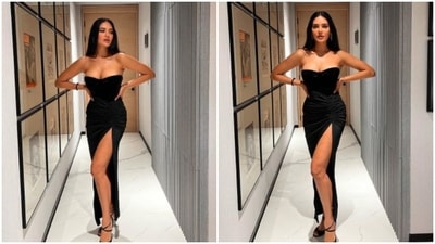 Esha Gupta can pull off any outfit with ease. In this photo uploaded on her Instagram handle, the actor redefined elegance in a strapless black corset bustier top and a thigh-high slit drawstring high-rise skirt. (Instagram/@egupta) Esha Gupta can pull off any outfit with ease. In this photo uploaded on her Instagram handle, the actor redefined elegance in a strapless black corset bustier top and a thigh-high slit drawstring high-rise skirt. (Instagram/@egupta)
