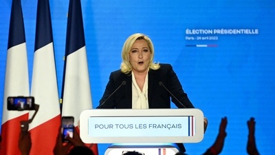 French far-right party Rassemblement National (RN) presidential candidate Marine Le Pen delivers a speech after the announcement of the first projections by polling firms of the French presidential election's second round results. (AFP) French far-right party Rassemblement National (RN) presidential candidate Marine Le Pen delivers a speech after the announcement of the first projections by polling firms of the French presidential election's second round results. (AFP)