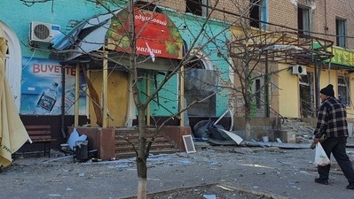 A man walks next to a residential building damaged by a shelling, as Russia's attack on Ukraine continues, in Rubizhne, the Luhansk region, Ukraine.&nbsp; (Reuters file photo)