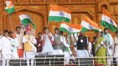 Union home minister Amit Shah with others waves the national flag during Veer Kunwar Singh Vijayotsav at Jagdishpur in Bhojpur district on April 23. (Santosh Kumar/HT PHOTO)