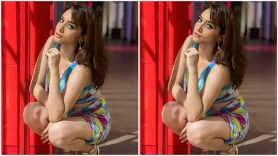 Ankita wore the ensemble with minimal accessories. She chose white pointed high heels, a statement ring, and dangling earrings adorned with stones. Side parted open tresses styled with wavy ends rounded off Ankita's hairdo. (Instagram/@lokhandeankita) Ankita wore the ensemble with minimal accessories. She chose white pointed high heels, a statement ring, and dangling earrings adorned with stones. Side parted open tresses styled with wavy ends rounded off Ankita's hairdo. (Instagram/@lokhandeankita)