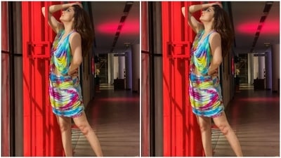 Ankita's sleeveless dress comes decorated with colourful tie-dye patterns in multiple shades, including blue, pink, yellow, purple, green and white hues. Her georgette ensemble also features a cut-out detail on the waist flaunting the star's midriff. (Instagram/@lokhandeankita) Ankita's sleeveless dress comes decorated with colourful tie-dye patterns in multiple shades, including blue, pink, yellow, purple, green and white hues. Her georgette ensemble also features a cut-out detail on the waist flaunting the star's midriff. (Instagram/@lokhandeankita)