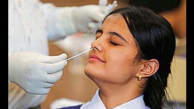 A student getting her Covid test done at La Martiniere Girls College in Lucknow on Monday. (Deepak Gupta/HT Photo) A student getting her Covid test done at La Martiniere Girls College in Lucknow on Monday. (Deepak Gupta/HT Photo)
