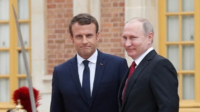 French President Emmanuel Macron with his Russian counterpart Vladimir Putin. (AFP) French President Emmanuel Macron with his Russian counterpart Vladimir Putin. (AFP)