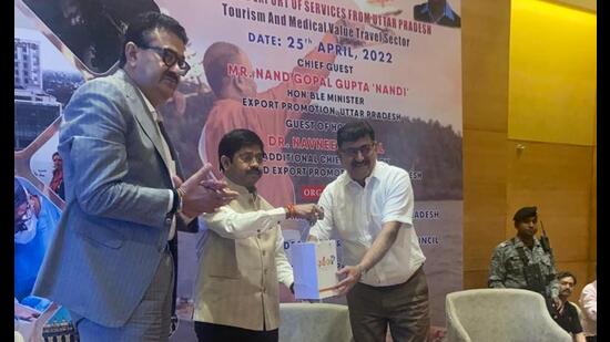 Additional chief secretary Navneet Sehgal, investment promotion minister Nand Gopal Gupta and director of Healthcity hospital Dr Sandeep Kapoor at the event. (Sourced)