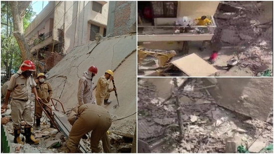 Rescue personnel clearing debris from the collapse site in Delhi's Satya Niketan.(Twitter/ANI)