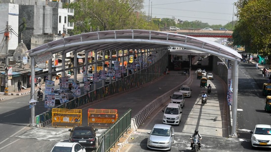 Vehicles ply on the newly inaugurated Ashram underpass on the Mathura road, in New Delhi,(PTI)