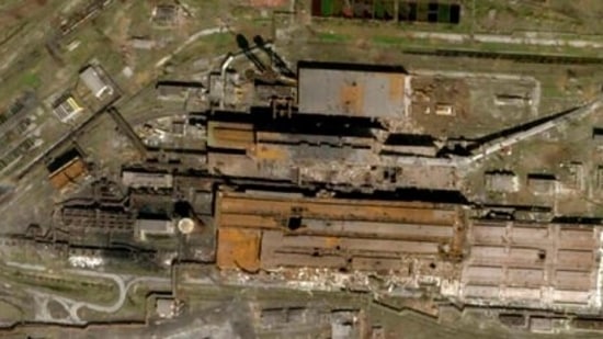 The Azovstal Steel Plant in Mariupol, Ukraine, with some large holes blasted in the roof.&nbsp;(Planet Labs via AP)
