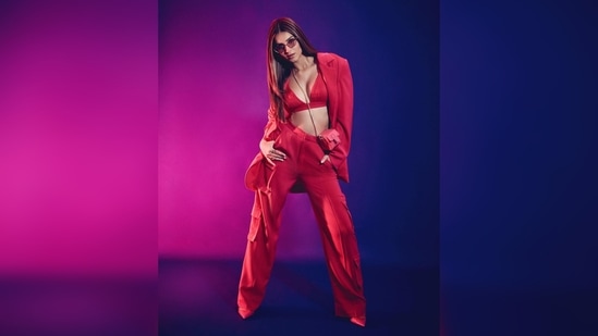 Tara Sutaria set the internet on fire with her fierce yet elegant look in this red blazer and trouser set.(Instagram/@tarasutaria)