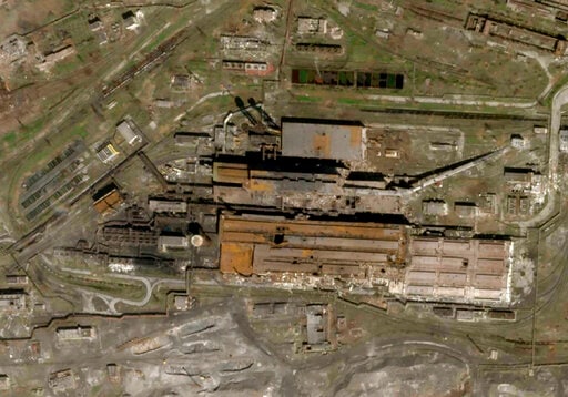 The Azovstal Steel Plant in Mariupol, Ukraine, with some large holes blasted in the roof. (Planet Labs via AP) The Azovstal Steel Plant in Mariupol, Ukraine, with some large holes blasted in the roof. (Planet Labs via AP)