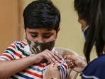 A healthcare worker administers a dose of the Corbevax vaccine to a child. (HT file photo) A healthcare worker administers a dose of the Corbevax vaccine to a child. (HT file photo)