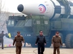 This picture shows North Korean leader Kim Jong Un (C) walking near what state media report says a new type inter-continental ballistic missile (ICBM). This picture shows North Korean leader Kim Jong Un (C) walking near what state media report says a new type inter-continental ballistic missile (ICBM).