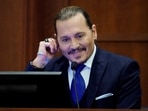 Actor Johnny Depp reacts as he testifies in the courtroom during the defamation trial against ex-wife Amber Heard at the Fairfax County Circuit Courthouse in Fairfax, Virginia. (Steve Helber/Pool via REUTERS)