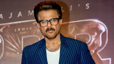 Anil Kapoor poses for pictures as he arrives to attend birthday party of Pen Studios CMD Dr Jayantialal Gada, in Mumbai. (PTI) (PTI)