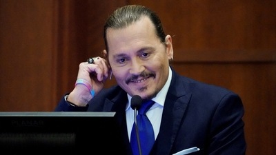 Actor Johnny Depp reacts as he testifies in the courtroom during the defamation trial against ex-wife Amber Heard at the Fairfax County Circuit Courthouse in Fairfax, Virginia. (Steve Helber/Pool via REUTERS) (REUTERS)