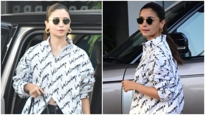 Alia Bhatt's oversized shirt and distressed denim shorts is the glam airport look for newlywed modern woman: All pics (HT Photo/Varinder Chawla) Alia Bhatt's oversized shirt and distressed denim shorts is the glam airport look for newlywed modern woman: All pics (HT Photo/Varinder Chawla)