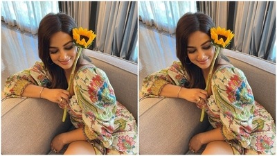 In the end, Harnaaz styled the printed dress by teaming it up with gold heels with gladiator straps, statement rings, gold hoop earrings, side-parted open locks, winged eyeliner, subtle smoky eye shadow, glowing skin, and blushed cheeks. What do you think of Harnaaz's look? (Instagram/@harnaazsandhu) In the end, Harnaaz styled the printed dress by teaming it up with gold heels with gladiator straps, statement rings, gold hoop earrings, side-parted open locks, winged eyeliner, subtle smoky eye shadow, glowing skin, and blushed cheeks. What do you think of Harnaaz's look? (Instagram/@harnaazsandhu)
