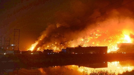 A view of the fire that broke out at the Bhalswa landfill site in north Delhi on Tuesday night (HT Photo)