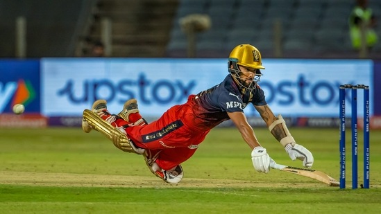 Rajat Patidar of Royal Challengers Bangalore dives as he takes a run during the Indian Premier League match against Rajasthan Royals(IPL)