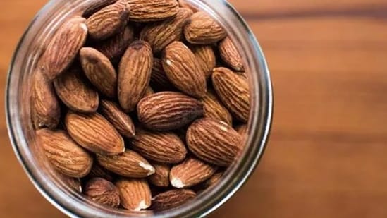 Almonds: Almonds may help boost sleep quality as well. This is because almonds are a source of the hormone melatonin. Melatonin regulates your sleeping clock and signals your body to prepare for a sound sleep.(Unsplash)