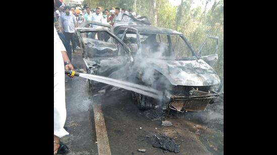 The damaged car Maruti Swift Dzire on Kotkapura-Faridkot road on Tuesday. (HT Photo)