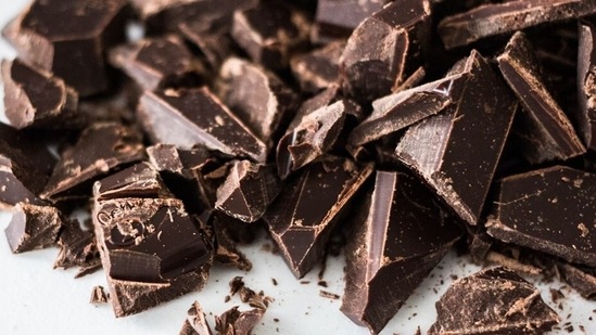 Dark chocolate: Dark chocolates are one of the best sleep inducing foods. Dark chocolates also contain serotonin, which has a calming effect on your mind and nervous system and will help you sleep like a baby.(Unsplash)