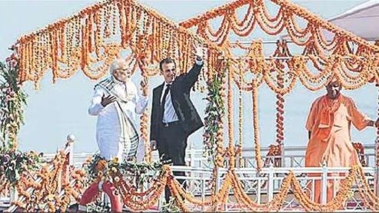 Prime Minister Narendra Modi and Uttar Pradesh chief minister Yogi Adityanath with French President Emmanuel Macron during a boat ride on Ganga river in 2018. (ht file)