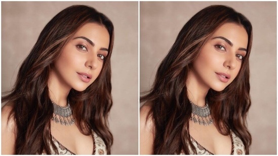 Styled by fashion stylist Anshika Verma, Rakul Preet wore her tresses open in soft wavy curls with a middle part.(Instagram/@rakulpreet)