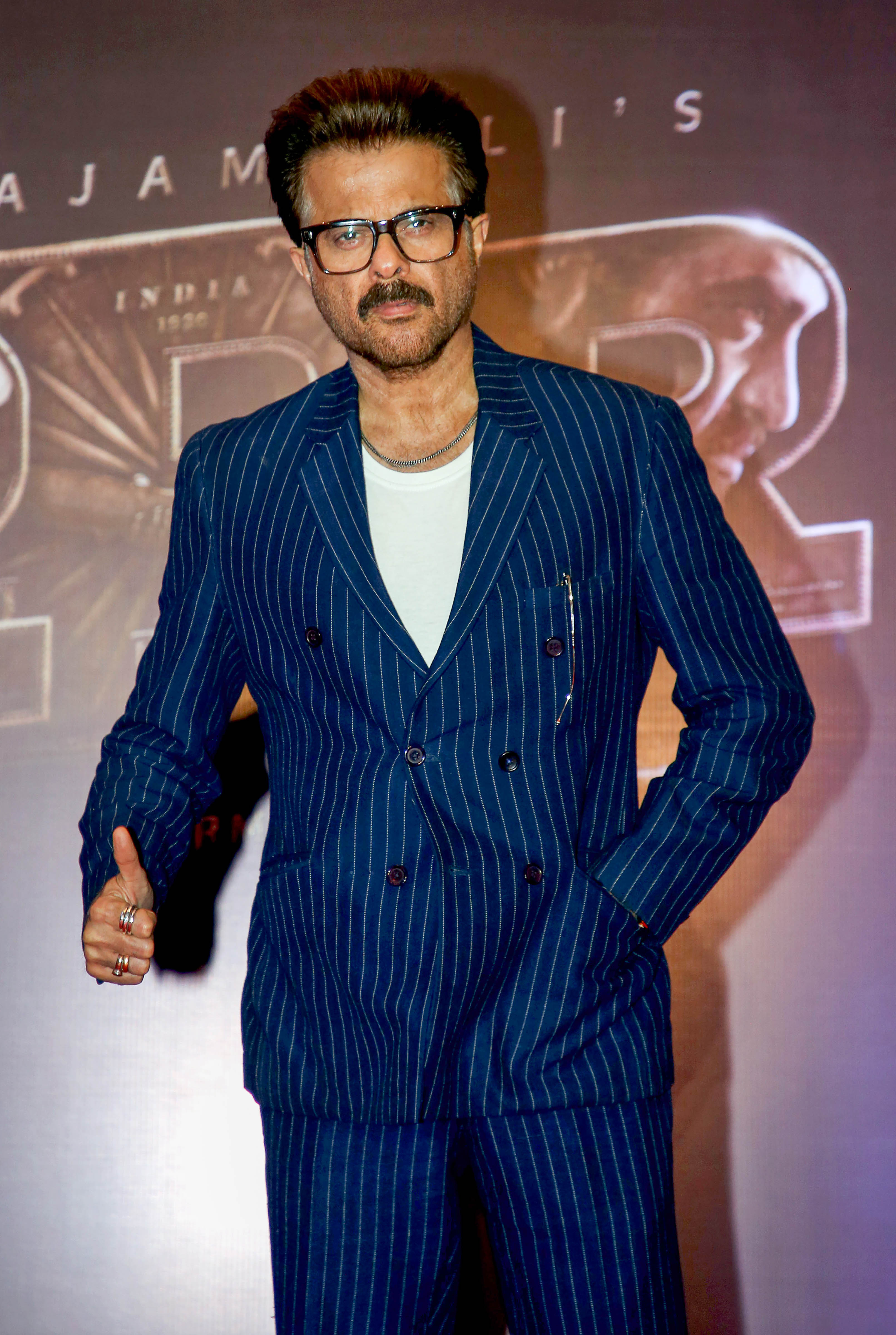 Anil Kapoor poses for pictures at an event in Mumbai. (PTI)