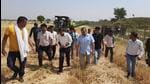 Kathua DC Rahul Yadav with officials and farmers near the Zero Line on Indo-Pak border in Jammu. (HT Photo) Kathua DC Rahul Yadav with officials and farmers near the Zero Line on Indo-Pak border in Jammu. (HT Photo)