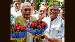 Newly-appointed Haryana Congress president Udai Bhan (right) with former CM Bhupinder Singh Hooda on Wednesday. (HT Photo)