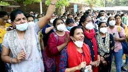 Members of the All India Institute of Medical Sciences (AIIMS) Nursing Union raise slogans as a part of an indefinite strike against the AIIMS administration.&nbsp;