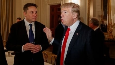 File photo of Elon Musk and Donald Trump from 2017. (Evan Vucci / AP)