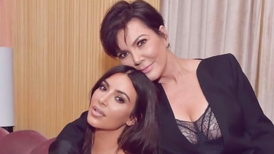 An old photo of Kim Kardashian and Kris Jenner. (Instagram)