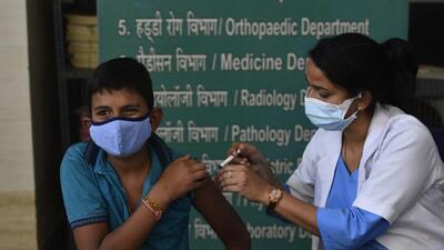 Gurugram, India – April 27, 2022: Children in the age group for 12 to 15 years receive a dose of Covid-19 vaccine at an Urban Primary Health Center (UPHC) polyclinic in Sector 31, Gurugram, India, on Wednesday, April 27, 2022. (Photo by Vipin Kumar/Hindustan Times) (Vipin Kumar/HT PHOTO) Gurugram, India – April 27, 2022: Children in the age group for 12 to 15 years receive a dose of Covid-19 vaccine at an Urban Primary Health Center (UPHC) polyclinic in Sector 31, Gurugram, India, on Wednesday, April 27, 2022. (Photo by Vipin Kumar/Hindustan Times) (Vipin Kumar/HT PHOTO)